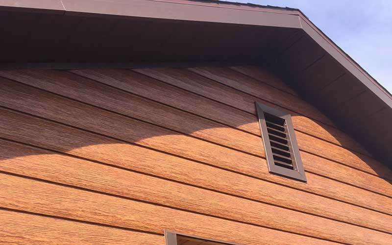 Woodgrain Siding | Metallic-coated and pre-painted steel 